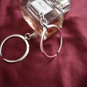 Silver horn hoop earrings